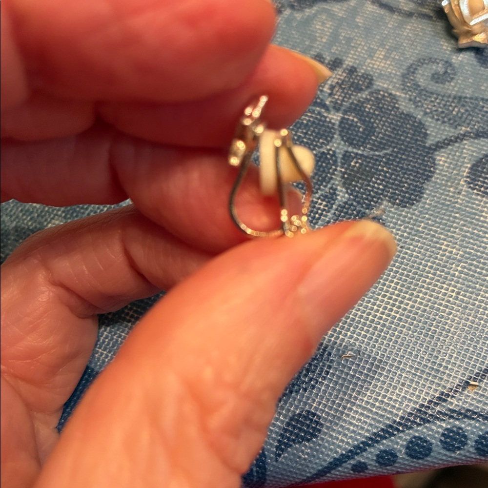 Claire’s Clip on Silver Star Earrings with White Cushion Backs - Picture 5 of 5